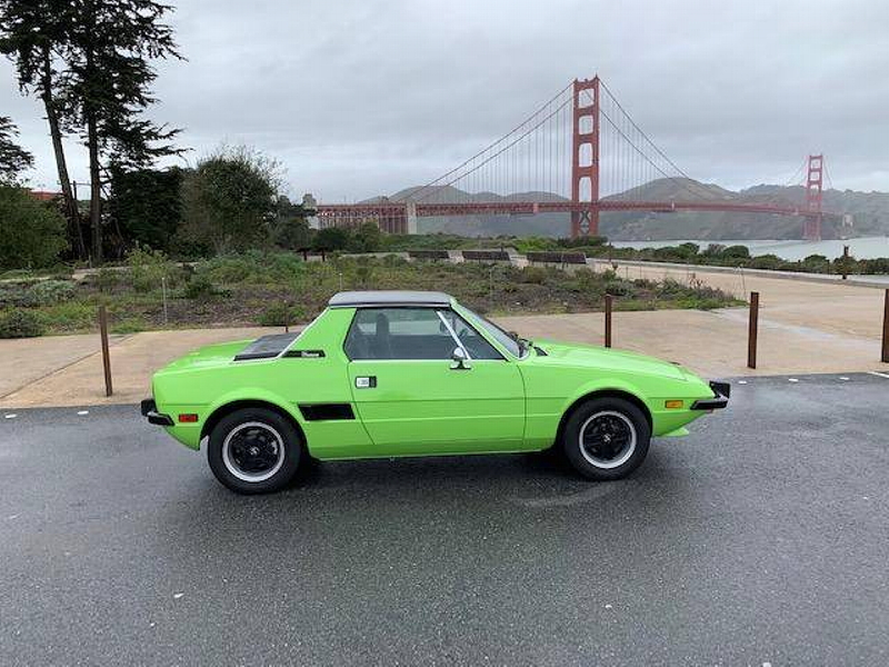 Illustration for article titled At $7,499, Could This Kermit Colored 1974 Fiat X1/9 Make it Easy Being Green?